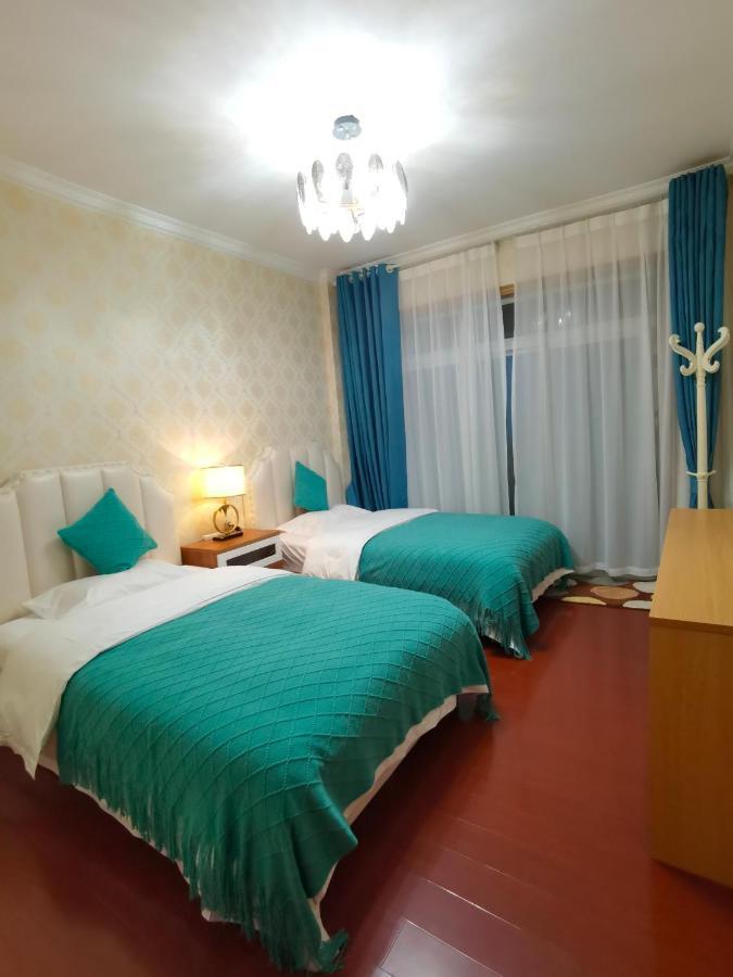 Mama Naxi Guesthouse Лицзян Экстерьер фото