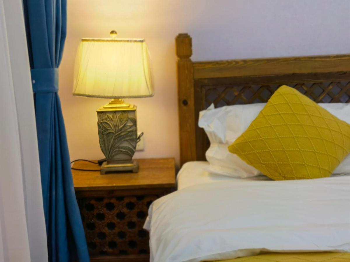 Mama Naxi Guesthouse Лицзян Экстерьер фото